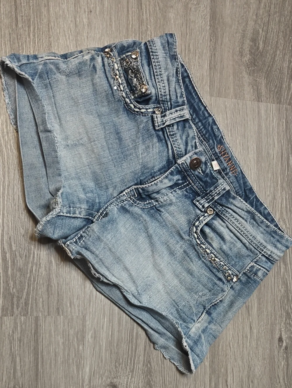 Light Wash Denim Short Shorts with Embellished Pockets